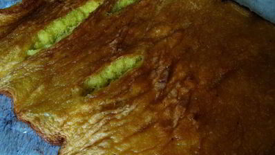 бисквитный рулет на ромовой пропитке с шоколадно-масляным кремом под шоколадной глазурью