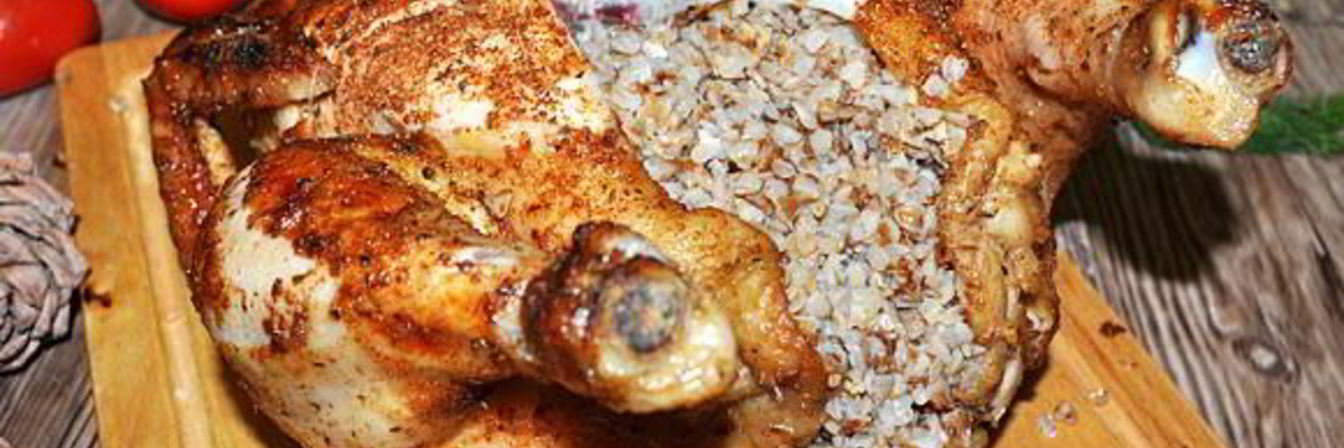 Фаршированная гречкой запеченная курица