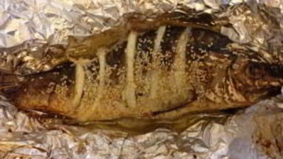 сазан, запеченный в духовке целиком