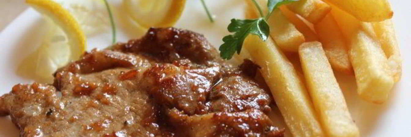 Свиной стейк в апельсиновом маринаде